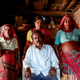 Sakharam Bhagat, 66, poses with his wives, Sakhri, Tuki and Bhaagi (L to R) inside their house